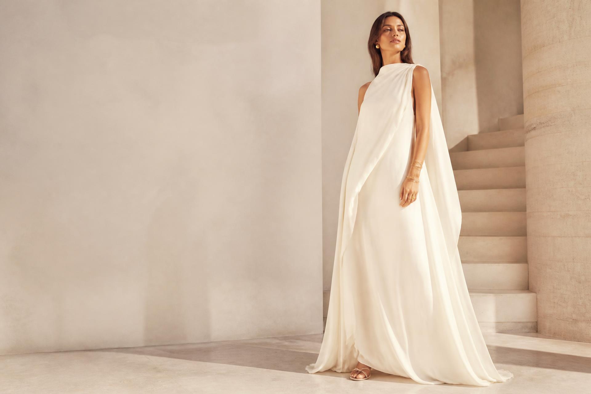 Victoria Sol Luna campaign featuring an ivory draped gown